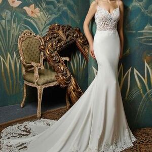 Brand new crepe ivory mermaid wedding gown